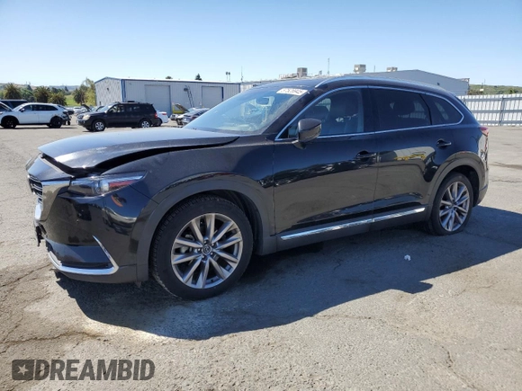 2020 Mazda CX-9 Grand Touring z VIN JM3TCADYXL0414926, wystawiony jako Copart lot #57528945 z przebiegiem 93 768 mil mil oraz Szkoda całkowita • Salvage title. Historia ofert i sprzedaży dostępna na DreamBid. Obrazek 1.