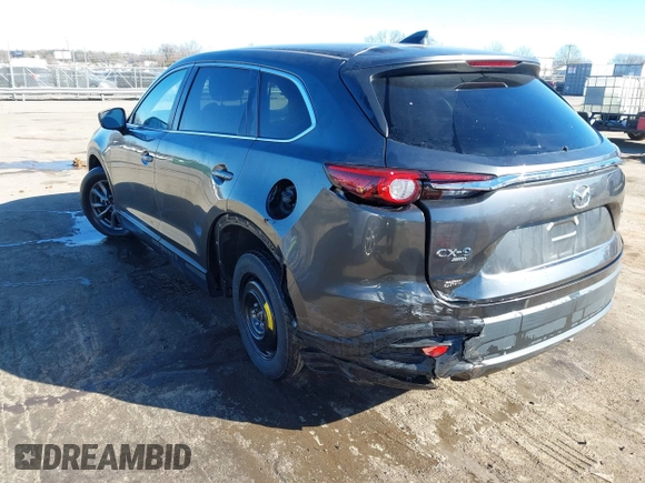 2022 Mazda CX-9 Sport with VIN JM3TCBBY5N0614589, listed as a IAAI auction lot 41295944 with 49,193 mi miles and . Bid and sale history available at DreamBid. Image 3.
