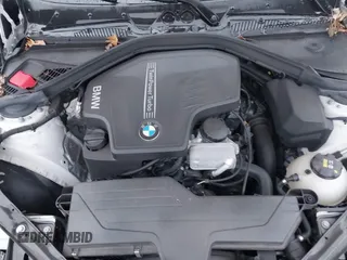 2016 BMW 2 Series 228i xDrive with VIN WBA1L9C59GV767802, listed as a IAAI auction lot 41132997 with 87,674 mi miles. Bid and sale history available at carsss.com. Image 10.