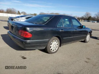 1996 Mercedes-Benz E Class with VIN WDBJF20F9TJ023003, listed as a Copart auction lot 86356784 with 230,944 mi miles and Salvage Title. Bid and sale history available at carsss.com. Image 3.