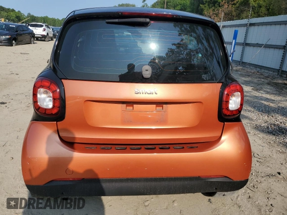 2016 Smart fortwo Passion с VIN WMEFJ5DA7GK066701, выставлен на аукционе Copart как лот 59093055 с пробегом 84 417 миль миль и Списание • Salvage title. История ставок и продаж доступна на DreamBid. Изображение 6.