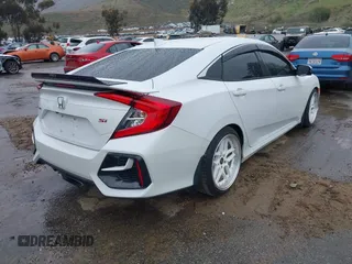 2020 Honda Civic Si z VIN 2HGFC1E59LH707630, wystawiony jako IAAI lot #41764310 z przebiegiem 116 714 mil mil oraz . Historia ofert i sprzedaży dostępna na DreamBid. Obrazek 4.