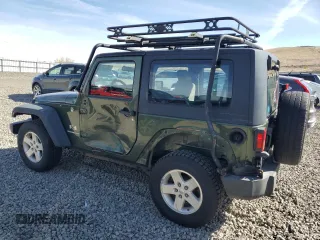 2009 Jeep Wrangler X with VIN 1J4FA24169L707695, listed as a Copart auction lot 49861955 with 89,807 mi miles and Salvage Title. Bid and sale history available at DreamBid. Image 2.