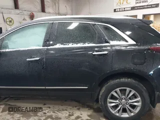 2021 Cadillac XT5 FWD Premium Luxury with VIN 1GYKNCRS3MZ198651, listed as a IAAI auction lot 41607734 with 49,275 mi miles. Bid and sale history available at carsss.com. Image 14.