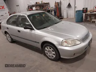 1999 Honda Civic LX with VIN 1HGEJ667XXL046973, listed as a IAAI auction lot 41981562 with 259,721 mi miles. Bid and sale history available at carsss.com. Image 1.