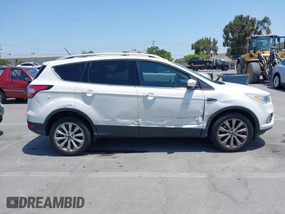 2018 Ford Escape Titanium with VIN 1FMCU0J94JUB26110, listed as a IAAI auction lot 42436285 with 59,586 mi miles and . Bid and sale history available at DreamBid. Image 13.