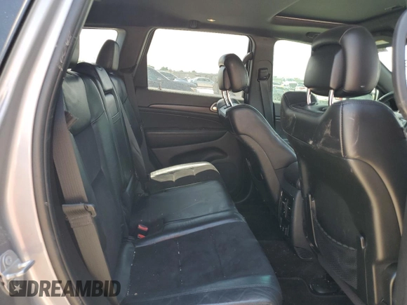 2018 Jeep Grand Cherokee Laredo with VIN 1C4RJFAG4JC272683, listed as a Copart auction lot 56823455 with 122,778 mi miles and Salvage title. Bid and sale history available at DreamBid. Image 11.