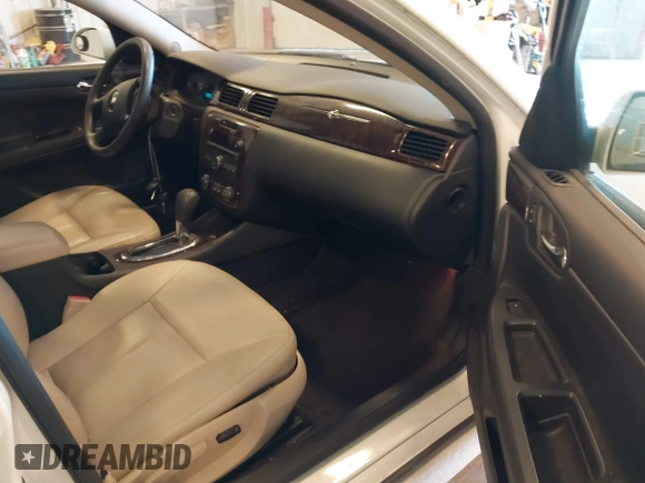 2015 Chevrolet Impala LTZ with VIN 2G1WC5E3XF1152424, listed as a IAAI auction lot 42222423 with 94,475 mi miles and . Bid and sale history available at DreamBid. Image 5.