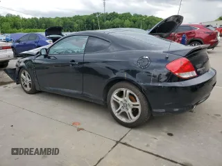 2006 Hyundai Tiburon GT z VIN KMHHN65F66U215304, wystawiony jako Copart lot #56141635 z przebiegiem 149 118 mil mil oraz Szkoda całkowita • Salvage title. Historia ofert i sprzedaży dostępna na DreamBid. Obrazek 2.