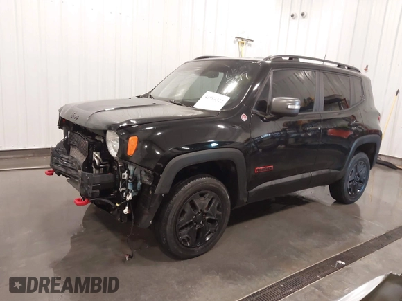 2018 Jeep Renegade Trailhawk z VIN ZACCJBCB7JPH91187, wystawiony jako IAAI lot #41984322 z przebiegiem 72 881 mil mil oraz . Historia ofert i sprzedaży dostępna na DreamBid. Obrazek 2.