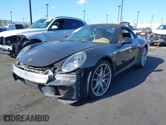 2012 Porsche 911 Carrera S with VIN WP0CB2A98CS154934, listed as a IAAI auction lot 41871101 with 69,411 mi miles and . Bid and sale history available at DreamBid. Image 23.