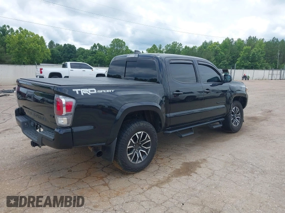 2020 Toyota Tacoma SR5 z VIN 3TMAZ5CN8LM138501, wystawiony jako IAAI lot #42321412 z przebiegiem 81 806 mil mil oraz . Historia ofert i sprzedaży dostępna na DreamBid. Obrazek 4.