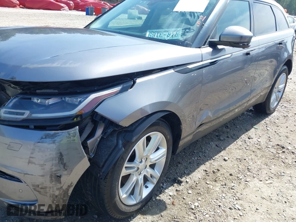 2020 Land Rover Range Rover Velar S z VIN SALYB2EX7LA259607, wystawiony jako IAAI lot #40980294 z przebiegiem 95 967 mil mil oraz . Historia ofert i sprzedaży dostępna na DreamBid. Obrazek 20.