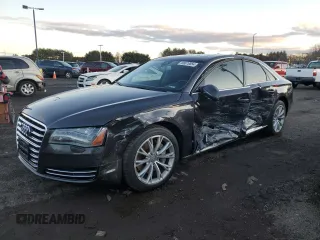 2014 Audi A8 3.0L TDI with VIN WAURMAFD7EN005005, listed as a Copart auction lot 86876854 with 141,985 mi miles and Salvage title. Bid and sale history available at DreamBid. Image 1.