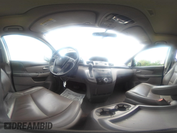 2013 Honda Odyssey Touring with VIN 5FNRL5H9XDB049390, listed as a IAAI auction lot 42532861 with 129,376 mi miles and . Bid and sale history available at DreamBid. Image 20.