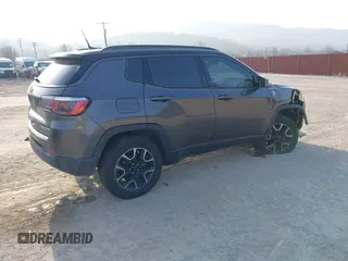2019 Jeep Compass Trailhawk with VIN 3C4NJDDB9KT622415, listed as a IAAI auction lot 41779314 with 98,930 mi miles and . Bid and sale history available at carsss.com. Image 4.