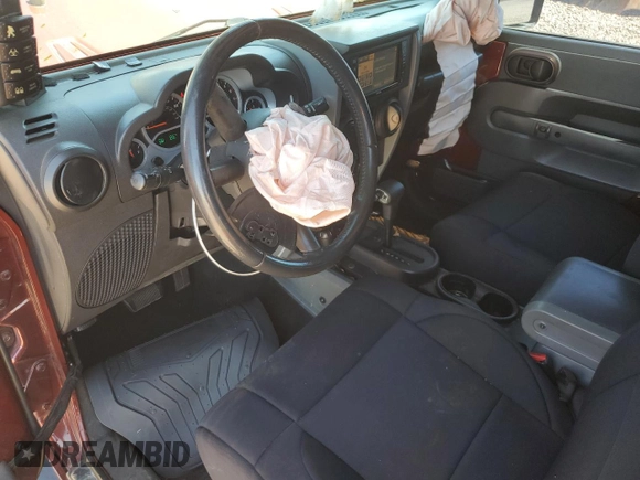 2010 Jeep Wrangler Rubicon with VIN 1J4BA6D14AL167077, listed as a Copart auction lot 54233795 with 148,638 mi miles and Salvage title. Bid and sale history available at DreamBid. Image 8.