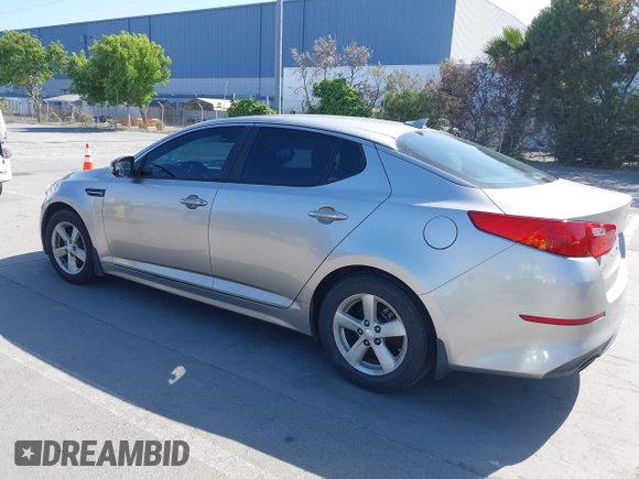 2014 Kia Optima LX with VIN KNAGM4A70E5482966, listed as a IAAI auction lot 42109539 with 194,519 mi miles and . Bid and sale history available at carsss.com. Image 3.