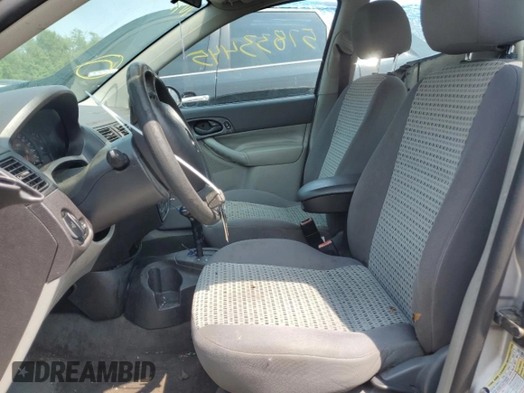 2007 Ford Focus S z VIN 1FAFP34N37W293421, wystawiony jako Copart lot #57833445 z przebiegiem 159 523 mil mil oraz Szkoda całkowita • Salvage title. Historia ofert i sprzedaży dostępna na DreamBid. Obrazek 7.