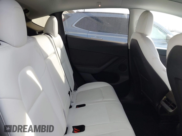 2023 Tesla Model Y Long Range z VIN 7SAYGDEE9PF623285, wystawiony jako IAAI lot #41383184 z przebiegiem 34 092 mil mil oraz . Historia ofert i sprzedaży dostępna na DreamBid. Obrazek 8.