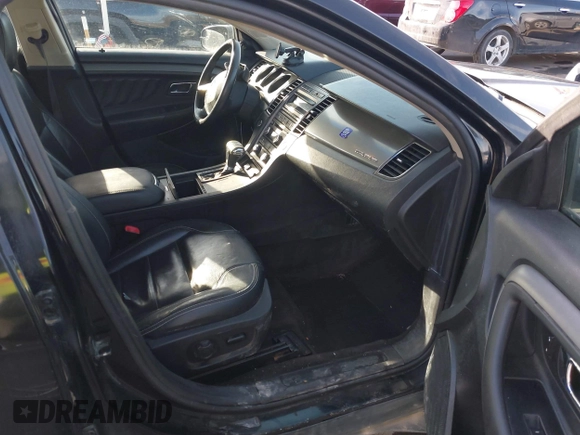 2012 Ford Taurus SEL z VIN 1FAHP2EW3CG128208, wystawiony jako IAAI lot #41020348 z przebiegiem 161 794 mil mil oraz . Historia ofert i sprzedaży dostępna na DreamBid. Obrazek 5.
