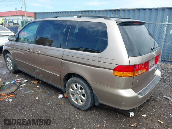 2003 Honda Odyssey EX with VIN 5FNRL18613B085840, listed as a IAAI auction lot 42121495 with Not Provided miles and . Bid and sale history available at carsss.com. Image 3.