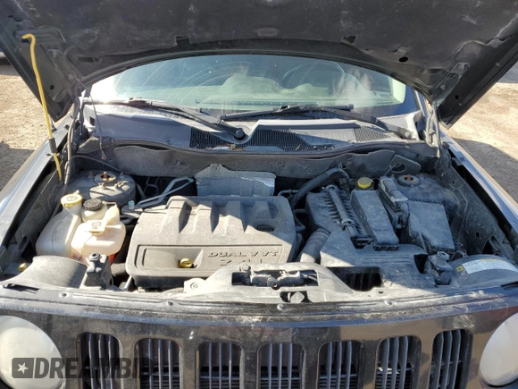 2010 Jeep Patriot Sport with VIN 1J4NF2GB8AD519311, listed as a Copart auction lot 53799085 with 203,762 mi miles and Salvage Title. Bid and sale history available at carsss.com. Image 12.