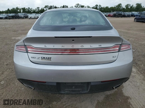 2016 Lincoln MKZ z VIN 3LN6L2GK3GR623560, wystawiony jako Copart lot #55337905 z przebiegiem 167 403 mil mil oraz Szkoda całkowita • Salvage title. Historia ofert i sprzedaży dostępna na DreamBid. Obrazek 6.