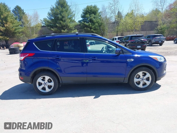 2016 Ford Escape SE with VIN 1FMCU9GX1GUB28870, listed as a IAAI auction lot 42129628 with 113,909 mi miles. Bid and sale history available at carsss.com. Image 13.