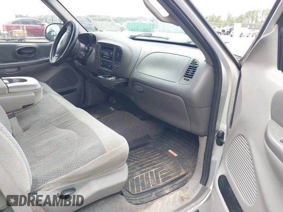 1999 Ford F-150 with VIN 1FTRX17W5XNC01330, listed as a IAAI auction lot 42101633 with 262,374 mi miles and . Bid and sale history available at DreamBid. Image 5.