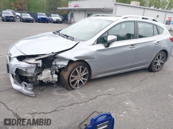 2018 Subaru Impreza Limited with VIN 4S3GTAT65J3731857, listed as a IAAI auction lot 42199163 with 62,621 mi miles and . Bid and sale history available at DreamBid. Image 2.