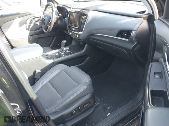 2018 Chevrolet Traverse Premier with VIN 1GNERKKW3JJ157873, listed as a IAAI auction lot 42448292 with 78,077 mi miles and . Bid and sale history available at DreamBid. Image 5.