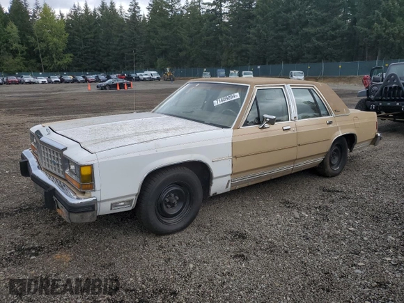 1986 Ford Crown Victoria z VIN 2FABP43F2GX172057, wystawiony jako Copart lot #71609094 z przebiegiem 63 900 mil mil oraz Tytuł czysty. Historia ofert i sprzedaży dostępna na DreamBid. Obrazek 1.