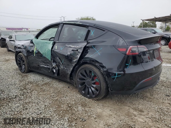 2024 Tesla Model Y Performance with VIN 7SAYGDEF1RF028278, listed as a Copart auction lot 48900935 with 41,606 mi miles and Salvage Title. Bid and sale history available at DreamBid. Image 2.
