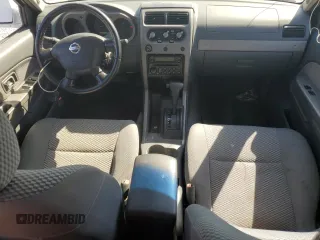 2002 Nissan Frontier SE z VIN 1N6ED27T42C319065, wystawiony jako Copart lot #74206474 z przebiegiem 147 724 mil mil oraz Szkoda całkowita • Salvage title. Historia ofert i sprzedaży dostępna na DreamBid. Obrazek 8.