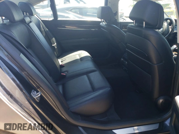 2013 BMW 7 Series 740Li xDrive z VIN WBAYF4C55DDE23588, wystawiony jako Copart lot #57968395 z przebiegiem 53 166 mil mil oraz Szkoda całkowita • Salvage title. Historia ofert i sprzedaży dostępna na DreamBid. Obrazek 10.