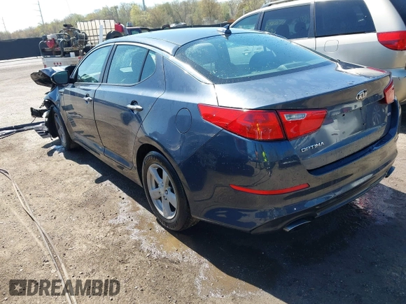 2015 Kia Optima LX with VIN KNAGM4A74F5569738, listed as a IAAI auction lot 41980622 with 161,434 mi miles. Bid and sale history available at carsss.com. Image 3.