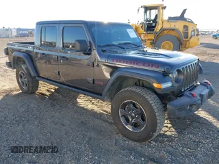 2023 Jeep Gladiator Rubicon z VIN 1C6JJTBG3PL538785, wystawiony jako IAAI lot #41045312 z przebiegiem 45 708 mil mil oraz . Historia ofert i sprzedaży dostępna na DreamBid. Obrazek 1.