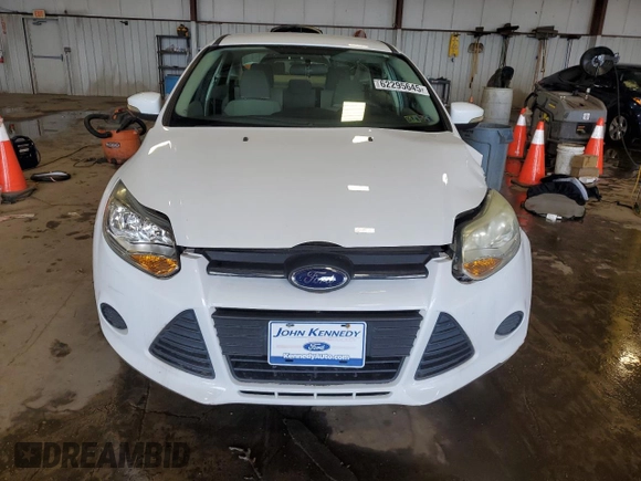 2013 Ford Focus SE with VIN 1FADP3F22DL249403, listed as a Copart auction lot 62295645 with 83,328 mi miles and Salvage title. Bid and sale history available at DreamBid. Image 5.