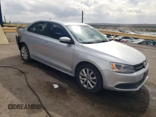 2014 Volkswagen Jetta SE with VIN 3VWD07AJ4EM427734, listed as a Copart auction lot 55093165 with 117,260 mi miles and Salvage title. Bid and sale history available at DreamBid. Image 4.