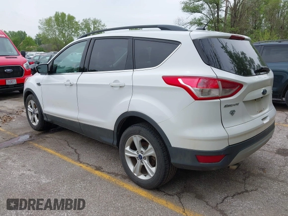 2016 Ford Escape SE with VIN 1FMCU9GX1GUC04085, listed as a IAAI auction lot 42126826 with 130,728 mi miles. Bid and sale history available at carsss.com. Image 3.