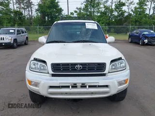 1999 Toyota RAV4 with VIN JT3GP10V8X7054552, listed as a IAAI auction lot 42361645 with 266,630 mi miles and . Bid and sale history available at DreamBid. Image 6.