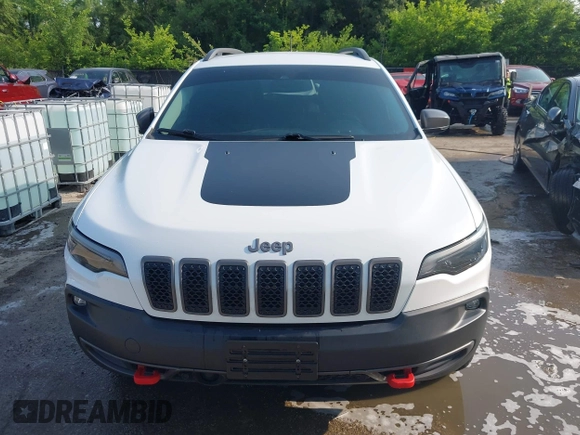 2021 Jeep Cherokee Trailhawk with VIN 1C4PJMBX4MD124980, listed as a IAAI auction lot 42372537 with 55,667 mi miles and . Bid and sale history available at DreamBid. Image 13.