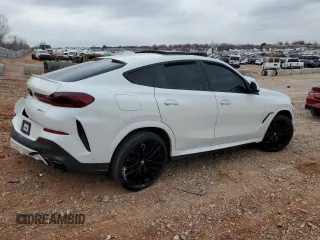 2021 BMW X6 sDrive40i z VIN 5UXCY4C03M9H36510, wystawiony jako Copart lot #86419524 z przebiegiem Nie podano mil oraz Szkody całkowita. Historia ofert i sprzedaży dostępna na DreamBid. Obrazek 3.