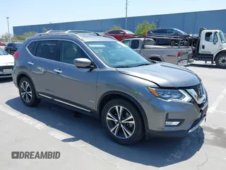 2017 Nissan Rogue SL Hybrid z VIN 5N1ET2MV9HC768242, wystawiony jako IAAI lot #42443514 z przebiegiem 84 879 mil mil oraz . Historia ofert i sprzedaży dostępna na DreamBid. Obrazek 1.