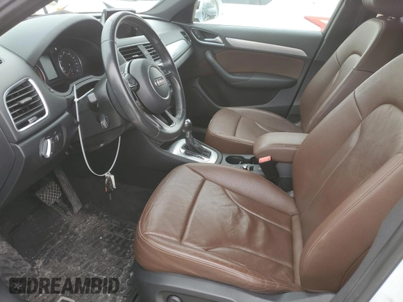 2017 Audi Q3 Premium Plus with VIN WA1JCCFSXHR008243, listed as a Copart auction lot 50393045 with 52,406 mi miles and Salvage title. Bid and sale history available at DreamBid. Image 7.