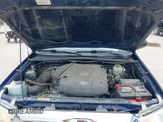 2014 Toyota Tacoma with VIN 3TMLU4EN6EM148851, listed as a IAAI auction lot 42307954 with 71,784 mi miles and . Bid and sale history available at DreamBid. Image 10.