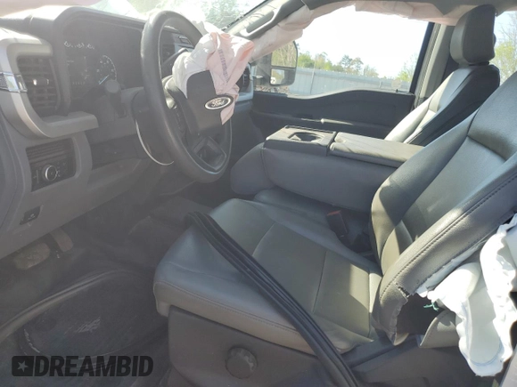 2023 Ford F-250 XL with VIN 1FT8W2BT7PED66555, listed as a Copart auction lot 54136785 with 57,548 mi miles and Salvage title. Bid and sale history available at DreamBid. Image 7.