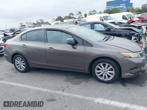 2012 Honda Civic EX with VIN 2HGFB2F89CH517330, listed as a IAAI auction lot 42116208 with 196,861 mi miles and . Bid and sale history available at DreamBid. Image 13.