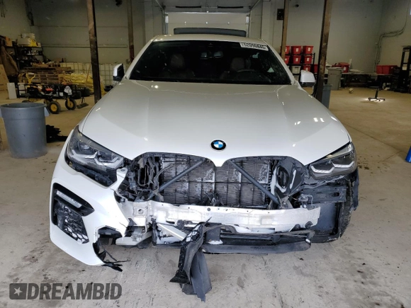 2020 BMW X6 xDrive40i z VIN 5UXCY6C07L9B43453, wystawiony jako Copart lot #52096845 z przebiegiem Nie podano mil oraz Szkoda całkowita • Salvage title. Historia ofert i sprzedaży dostępna na DreamBid. Obrazek 5.